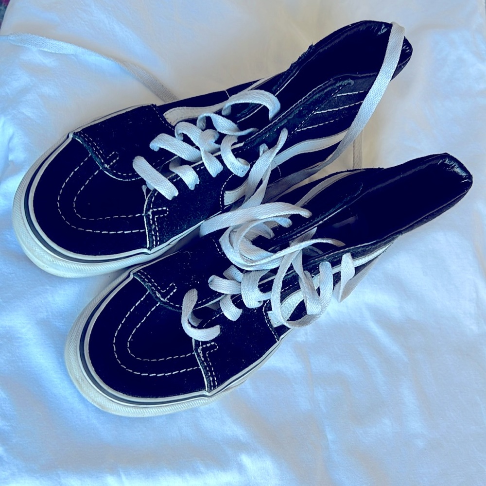 legendary high-top, Sidestripe™ shoe · Durable suede and canvas uppers · Lace-up